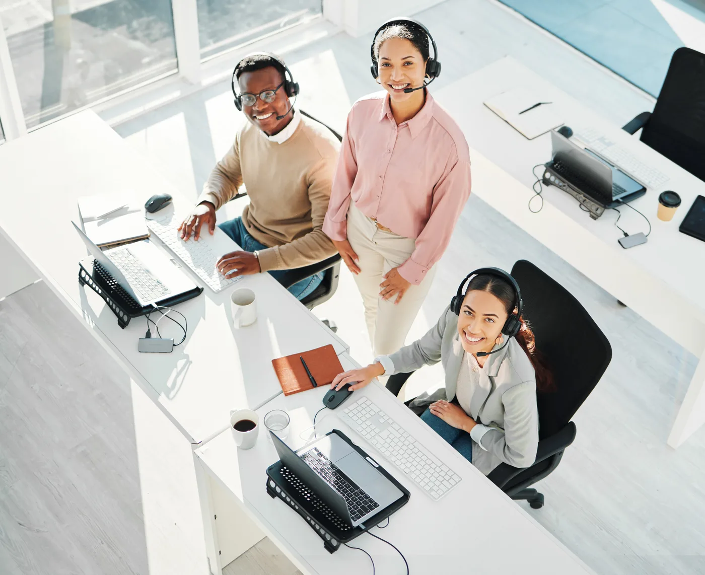 Customer service representatives with headsets